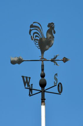 La bourse de Paris, telle une girouette, hésite encore autour des 3.700 points